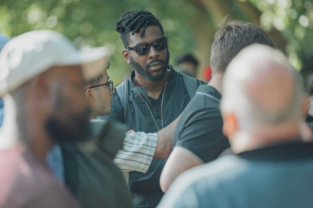 diverse people discussing in circle