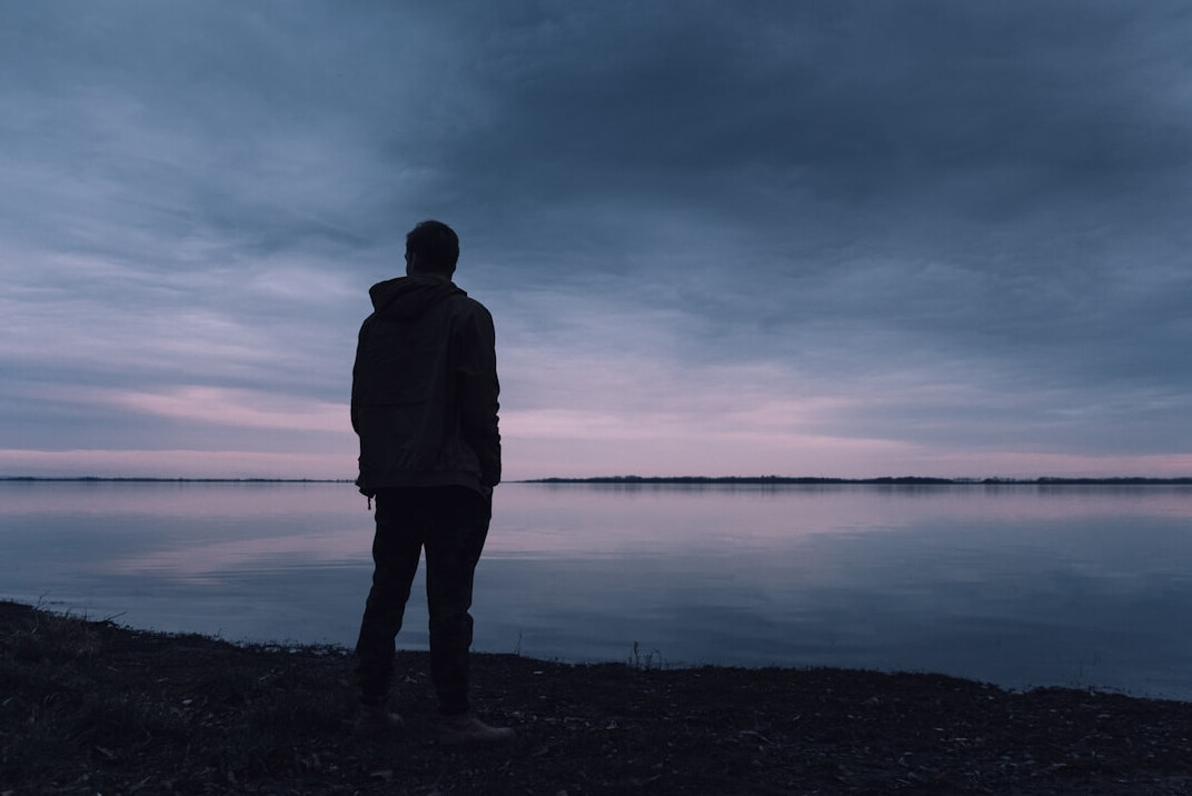 person thinking alone